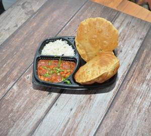 Poori Chola (4 Pcs) + Salad +  Rice+ Salt+ Pickle