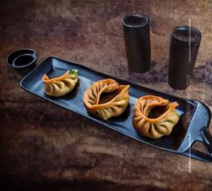 Veg cheese momos [fried]