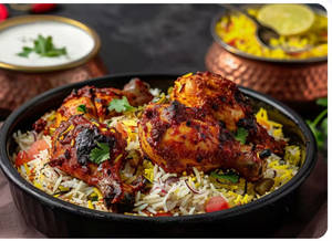 PANEER TIKKA BIRYANI WITH MINT RAITA [ 750ML SERVES 1-2 ] .