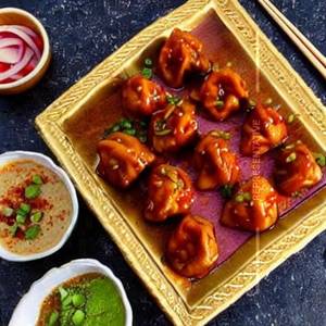 Veg Dumplings In Smoked Manchurian Sauce