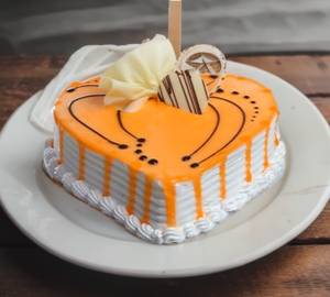 Yummy Heart Shape Butterscotch Eggless Cake