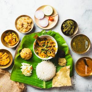 Assamese Thali With Bhagon Fish Curry