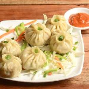 Chicken steamed momos [6 pieces]