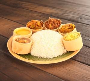 Veg thali (dal + bhaji + sabji + soyabean curry + salad + papad + sweet)