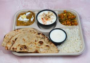 Dal Makhani + Mix Veg + Rice + Raita + 2 Roti + Salad + Gulab Jamun
