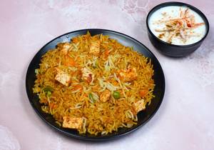 Paneer Biryani With Raita And Salad