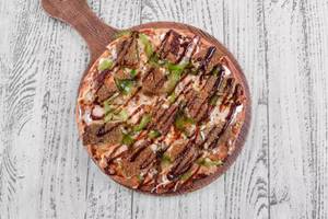 Chicken tandoori pizza