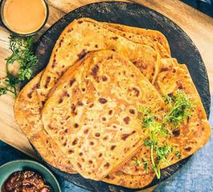 2 Ajwaini Paratha With Butter And Curd