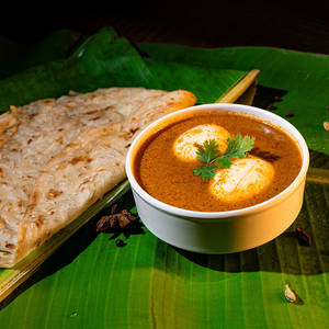 3 Parotta With Egg Curry [Serves 1].