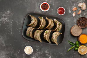 Chicken momos [8 pieces]