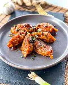 Vegetable tossed momos [6 pieces]