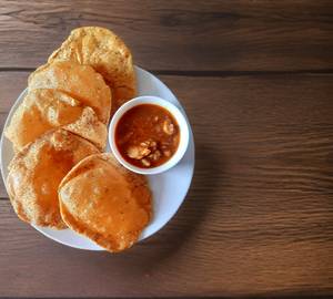 5 Poori with gravy aloo sabji