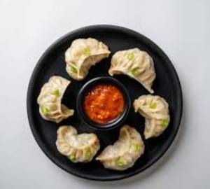 Veg Schezwan Momos    5 Pcs