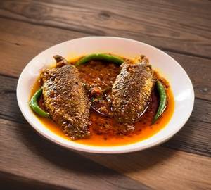 Koi fish thali (dal + bhaji + sabji + koi tel + salad + sweet )