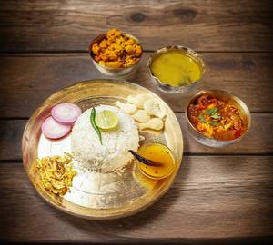 Fish thali (dal + bhaji + sabji + rui fish curry + salad + papad + sweet)