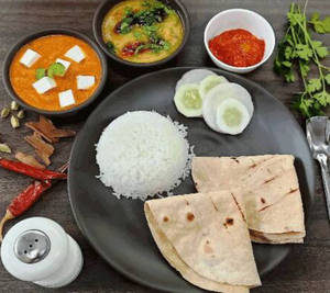 Paneer Curry Thali With Roti, Rice & Sweet