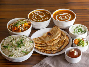 SIMPLE THALI (dal Makhani+mix Veg + Rajma+3 Butter Roti+rice + Salad)