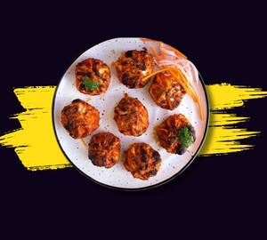 Veg pan fried momos in Schezwan sauce