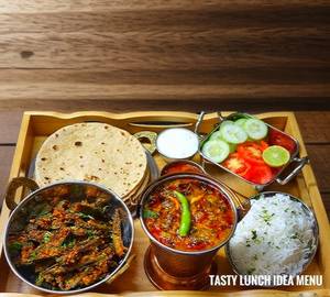 Rice Thali ( Rice+ Dal + Sabji + Dahi + 4 Roti + Salad + Pickle)