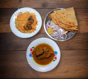 Chicken Masala Gravy [2 Pcs]+Chicken Biryani half 2pcs+2Tawa Roti+Cold Beverage 200m.l+raita+onion