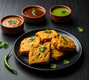 Bread Pakora (02 Nos) - Served With Chutney, Sauce & Salad.