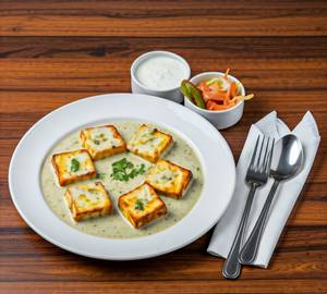 Paneer Malai Tikka (06 Pieces) - served with Salad.