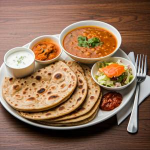 Roti Sabji (04 Pieces)- Served With Vegitable Sabji, Pickle, Chutney, Curd & Salad.