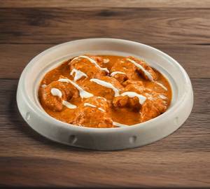 Chicken Momos In Dry Fruit Gravy (Half)