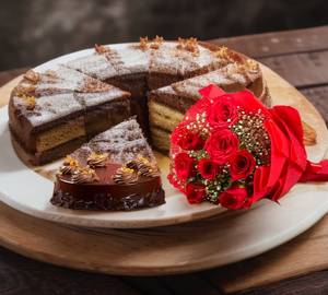 Deth by chocolate cake with red roses bouquet                                                           