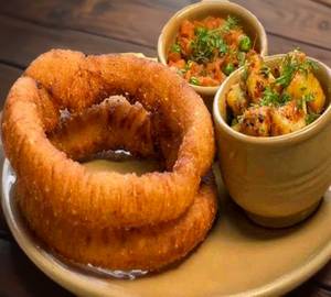Sel roti with veg plate [vegetables]