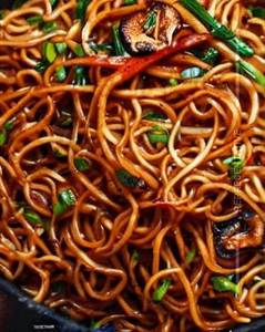Schezwan mushroom fried noodles