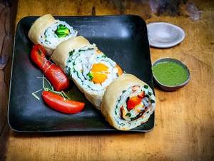 Egg Double Chicken Schezwan Roll  