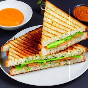 Schezwan Aloo Tikki Cheese Grilled Sandwich (Three Layer)
