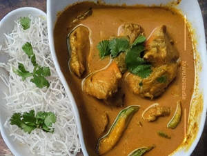 Chicken In Traditional Thai Panang Curry.