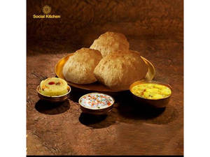 North Indian Bread-poori Aloo Bhaji+single Card Vada+sweet Kesari