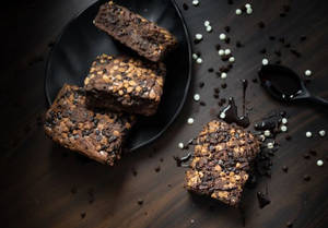 Warm Nutty Brownie With Chocolate Syrup