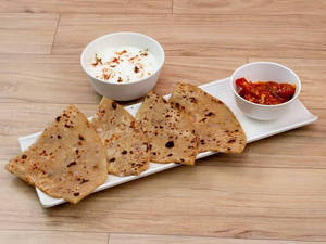 2 Alu Pyaz Prantha + Chole + Rayta