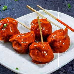 Veg Lollipop Gravy Momos