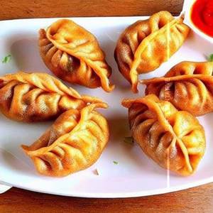 Veg Fried Momos (8 Pieces )