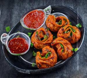 Schezwan Momo Chicken (8 Pcs)