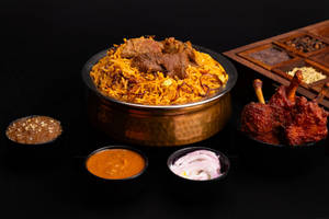 Boneless Mutton Biryani + Chicken Lollypop (3 Pcs)