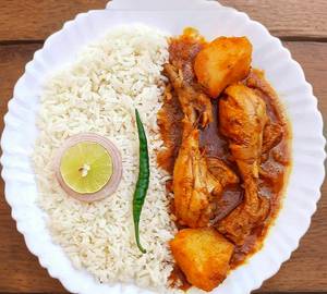 Steamed Rice With Chicken Leg Curry( 1 Big Piece)