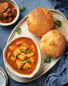 Aloo Sabzi With Poori And Pickle