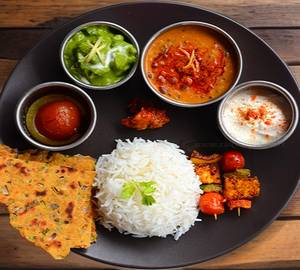 Dinner Rice + Masala Roti + Dal Tadka + Curd + Pickle + Tikki + Gulab Jamun