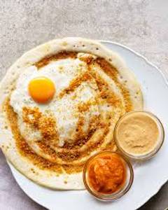 Egg chicken cheese dosa
