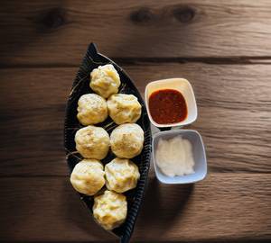 Veg steamed momos [8 pieces]