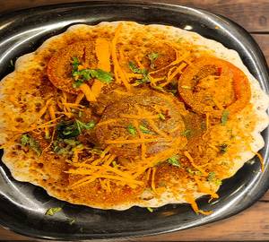 Open butter masala dosa