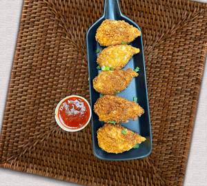 Veg Kurkure Momos (8 Pcs)