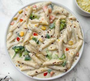 Penne pasta with creamy white sauce
