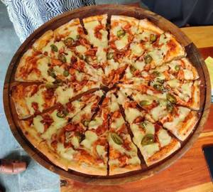 Chicken 65 pizza.  8 Inches